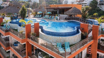 Outdoor pool, open 9:00 AM to 9:00 PM, pool umbrellas, sun loungers