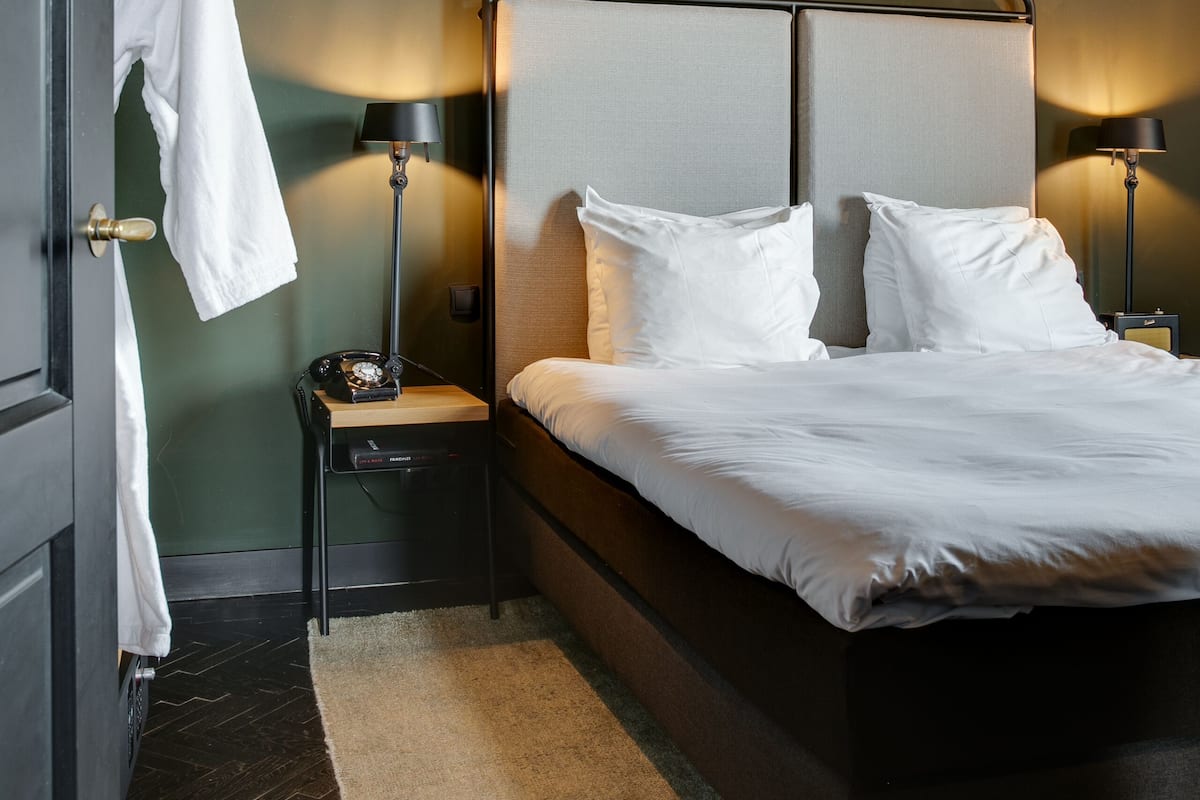 Suite – superior, byutsikt | Sengetøy av topp kvalitet, dundyner, minibar og safe på rommet