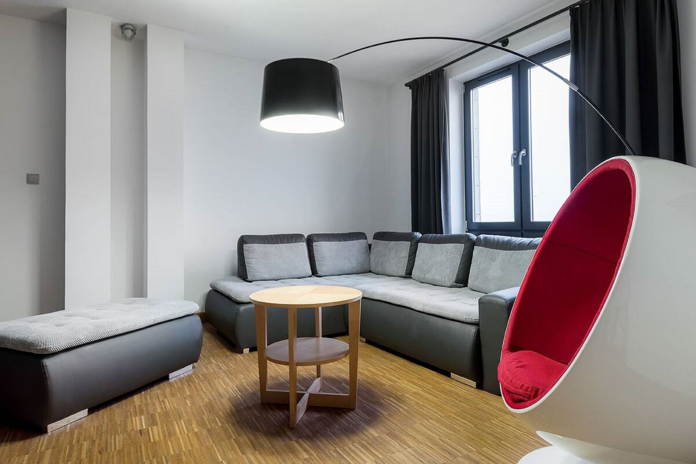 deluxe loft, 1 queen bed with sofa bed | living area | flat-screen tv