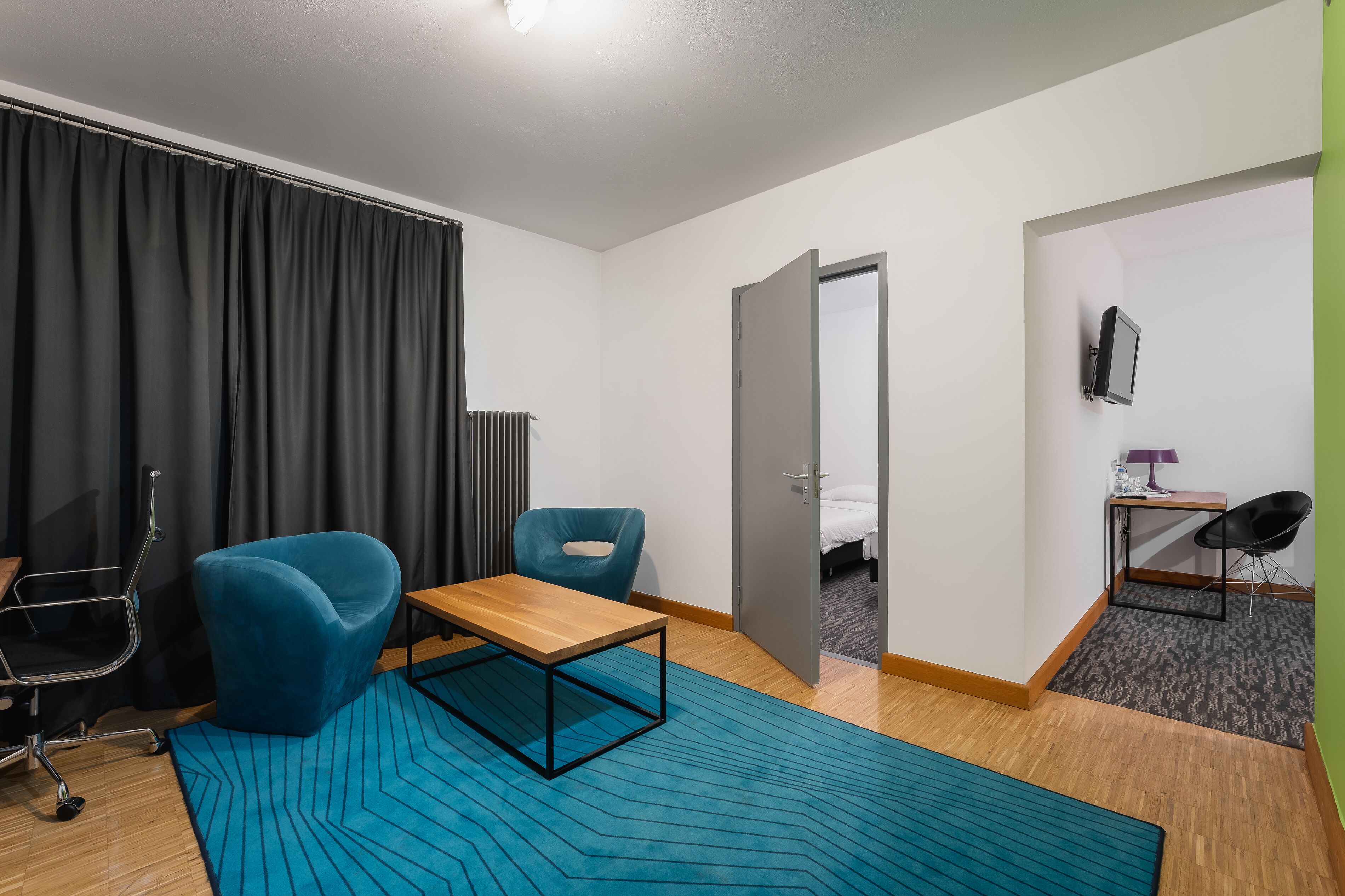 family shared dormitory | living room | flat-screen tv