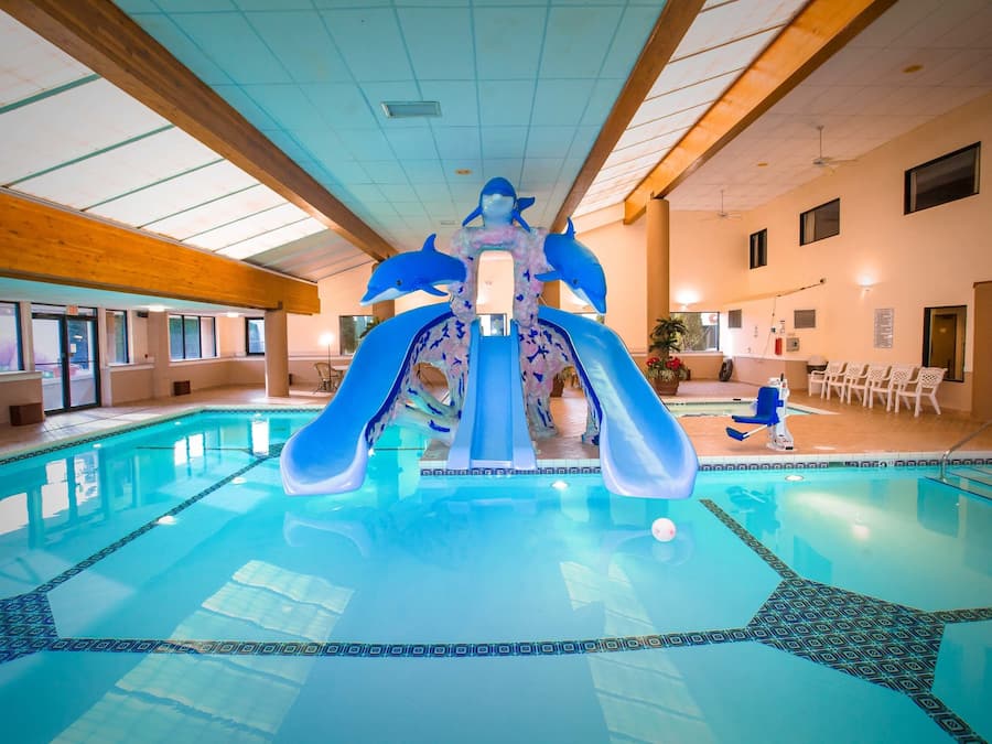 Indoor pool, seasonal outdoor pool, pool umbrellas, sun loungers