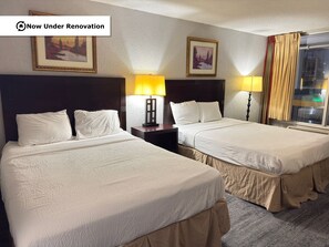 Quarto standard, 2 camas de casal, para não fumantes | Escrivaninha, espaço de trabalho para notebook, Wi-Fi de cortesia