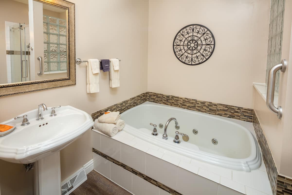 suite, 2 queen beds, lake view | bathroom | hair dryer, towels