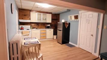 One Bedroom Suite 2 | Private kitchen | Fridge, microwave, stovetop, coffee/tea maker