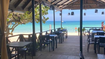 Breakfast, lunch, dinner served; international cuisine, beach views