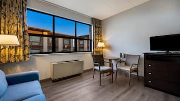Main Building Deluxe King w/ Sofabed | Living area