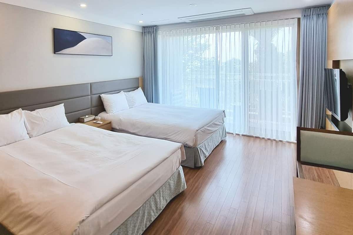 Deluxe Family Double | Premium bedding, soundproofing, free WiFi