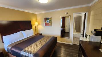 Deluxe Room, 1 Queen Bed, Non Smoking, Refrigerator & Microwave | Premium bedding, iron/ironing board, rollaway beds, free WiFi