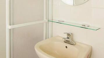 Family Suite, 1 Bedroom, No Windows | Bathroom sink