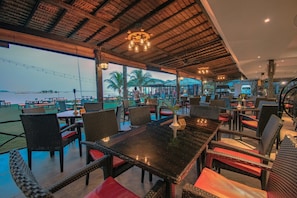 Breakfast, lunch, dinner served; international cuisine, beach views