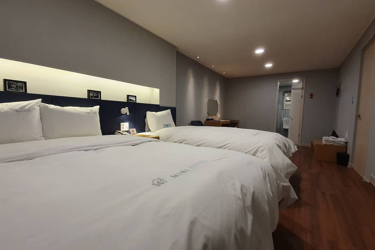 deluxe twin room | premium bedding, down duvets, memory-foam beds, in-room safe