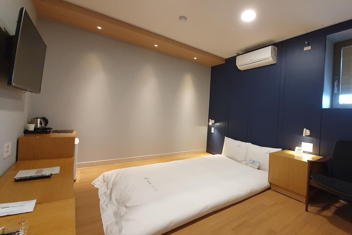 Korean Traditional Ondol Room | Premium bedding, down comforters, memory foam beds, in-room safe