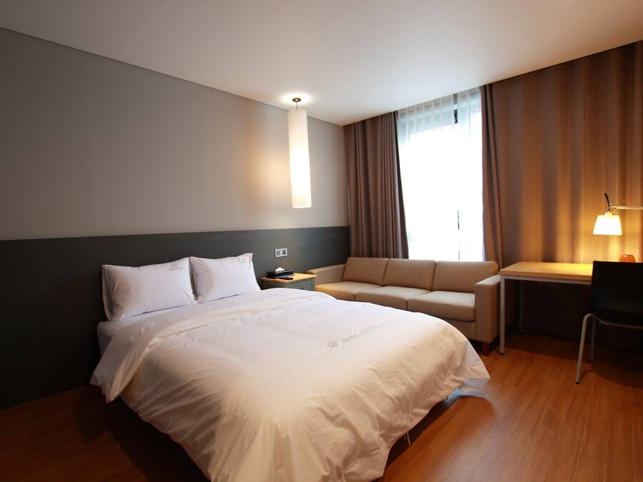 Chambre Deluxe double | Literie de qualité, couette en duvet