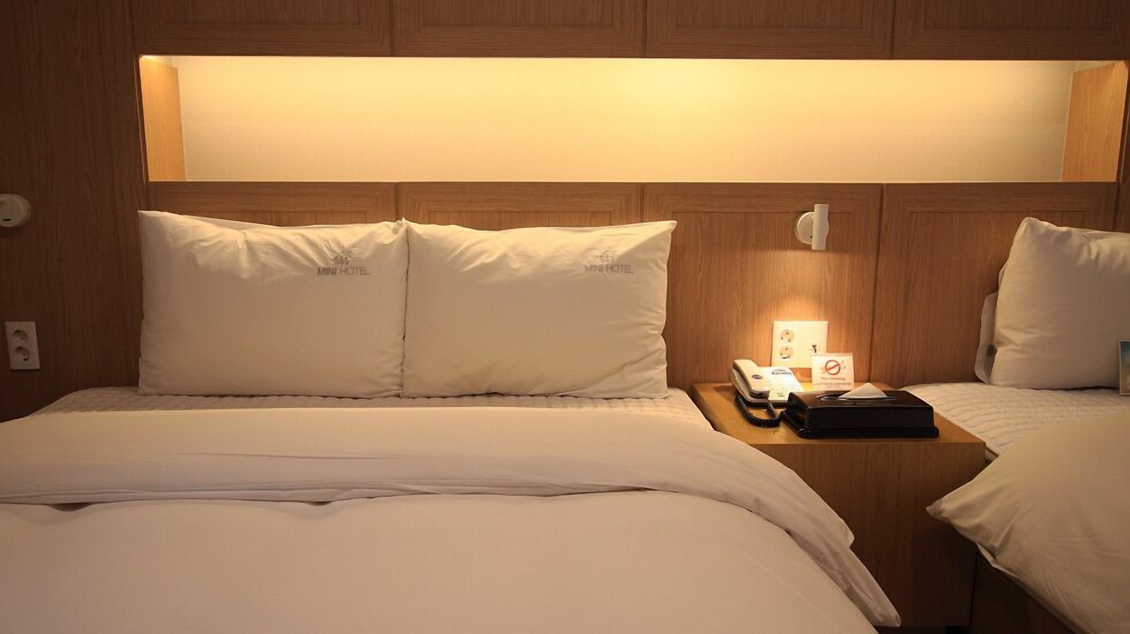 deluxe twin room | premium bedding, down duvets, memory-foam beds, in-room safe