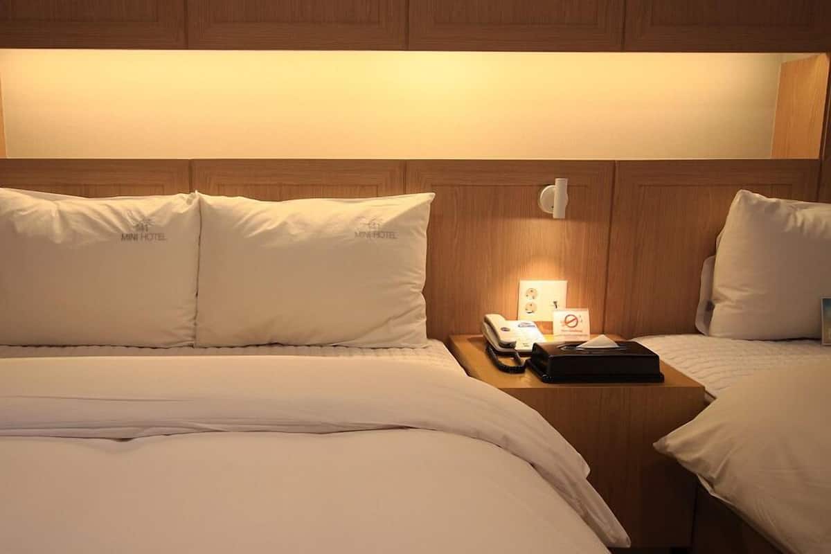 deluxe twin room | premium bedding, down duvets, memory-foam beds, in-room safe
