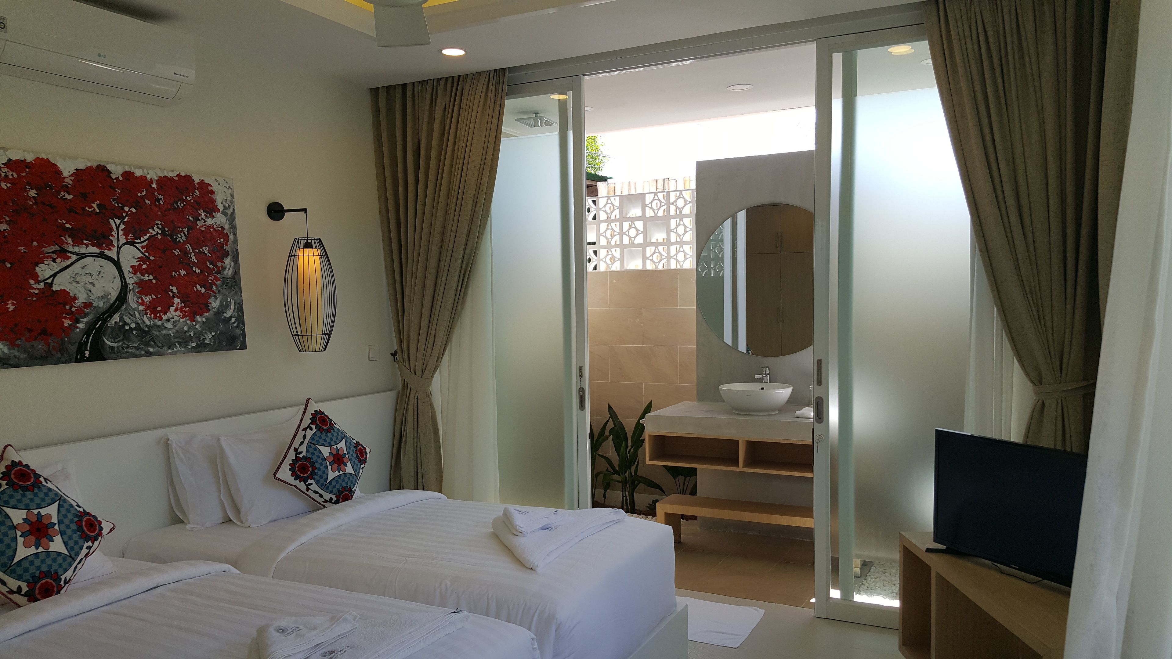 Deluxe bungalow, uitzicht op tuin | Kameruitzicht