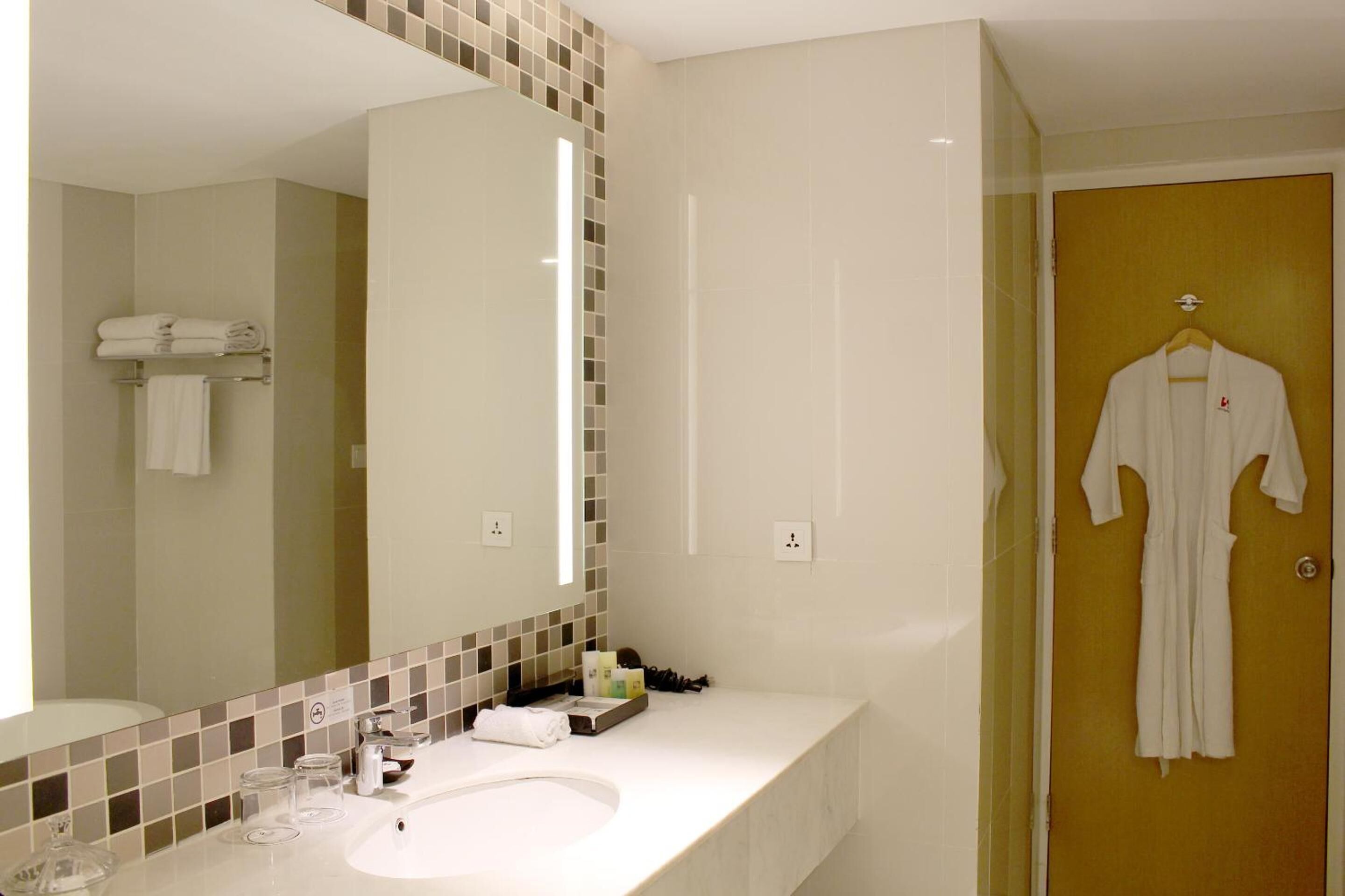business suite, 1 queen bed | bathroom | free toiletries, hair dryer, slippers, bidet