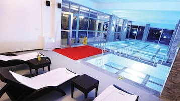 Indoor pool, open 2:00 PM to 11:00 PM, lifeguards on site