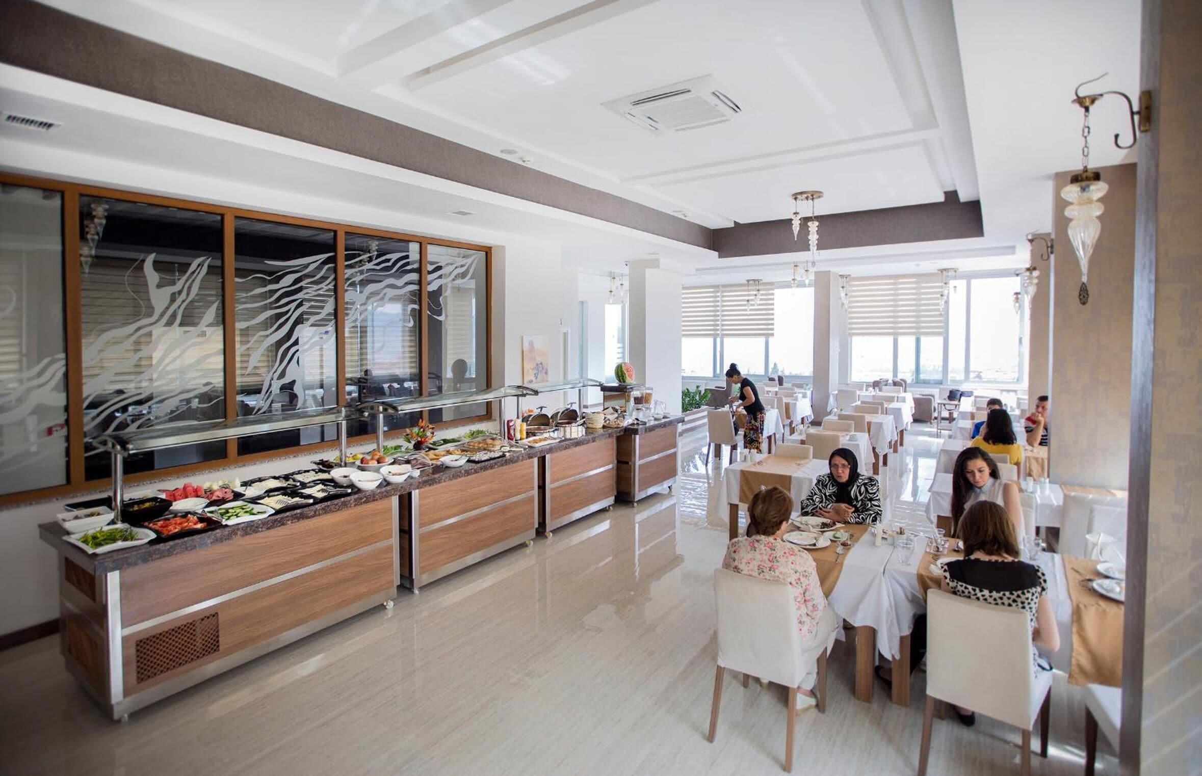 Breakfast, lunch, dinner served; international cuisine 