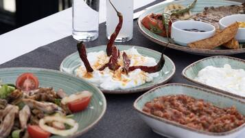 Breakfast, lunch, dinner served; international cuisine