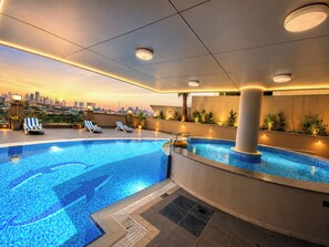 Outdoor pool, open 9 AM to 6 PM, sun loungers