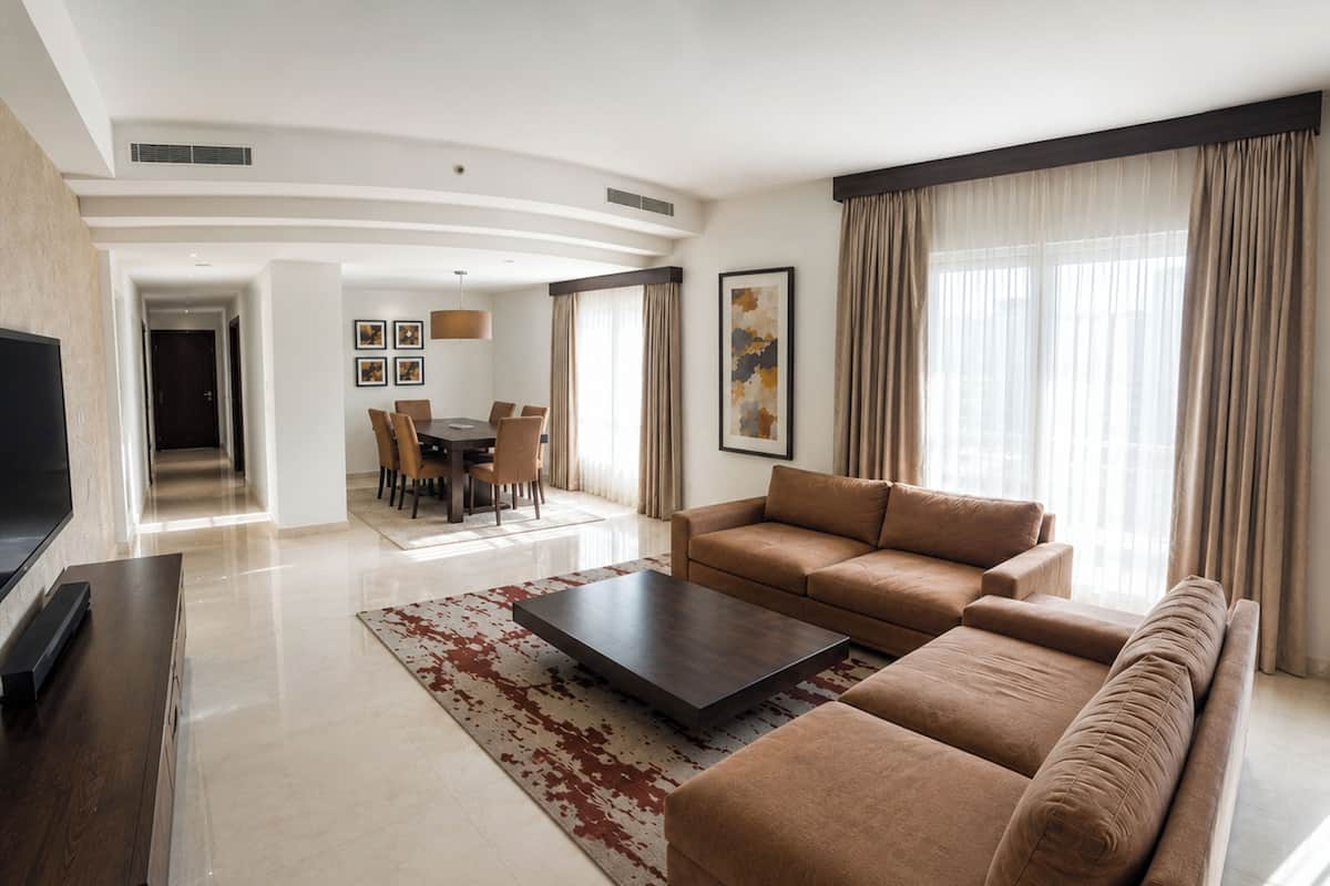 Apartment, 2 Bedrooms | Living area | 32-inch TV with cable channels