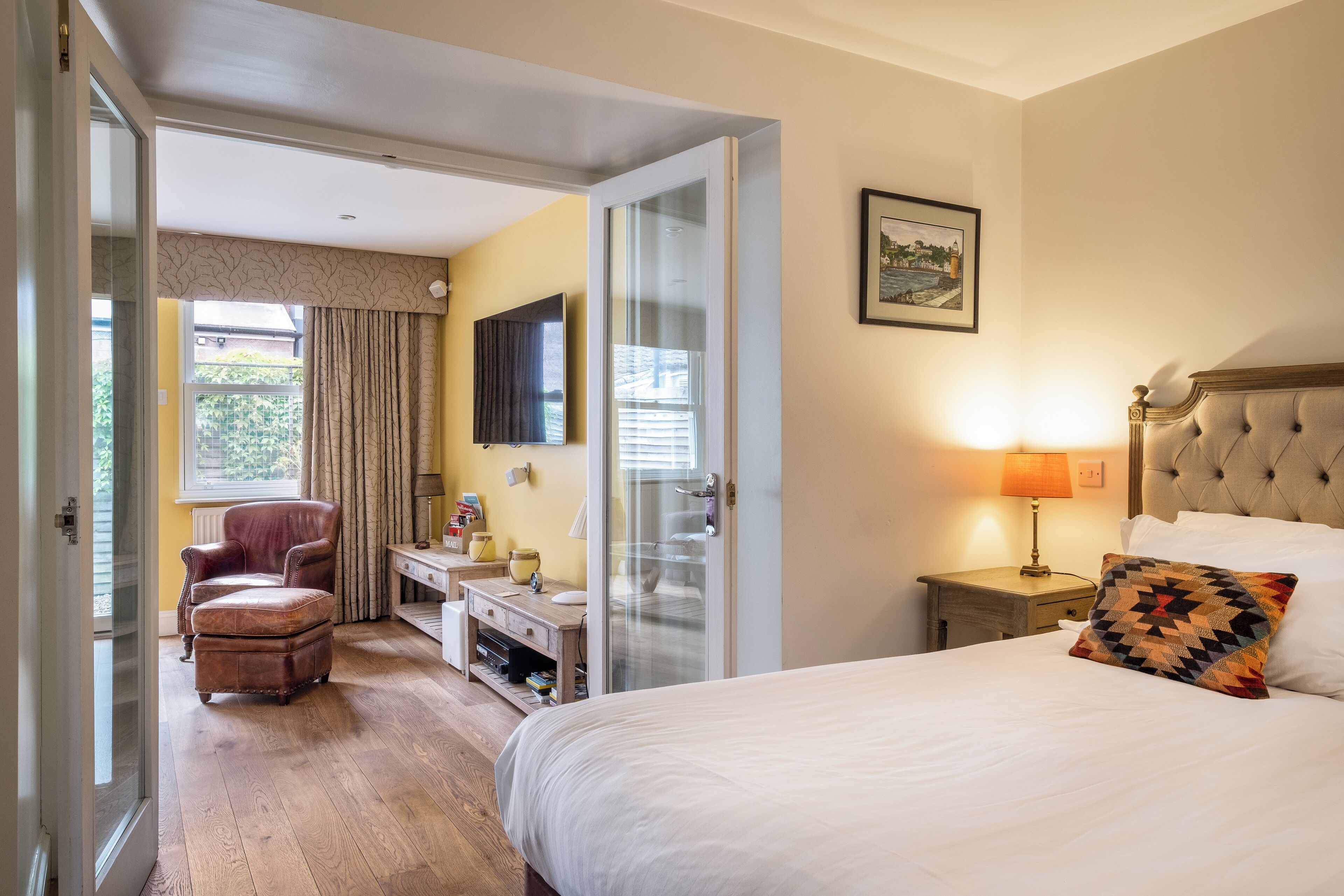 deluxe suite | egyptian cotton sheets, premium bedding, laptop workspace