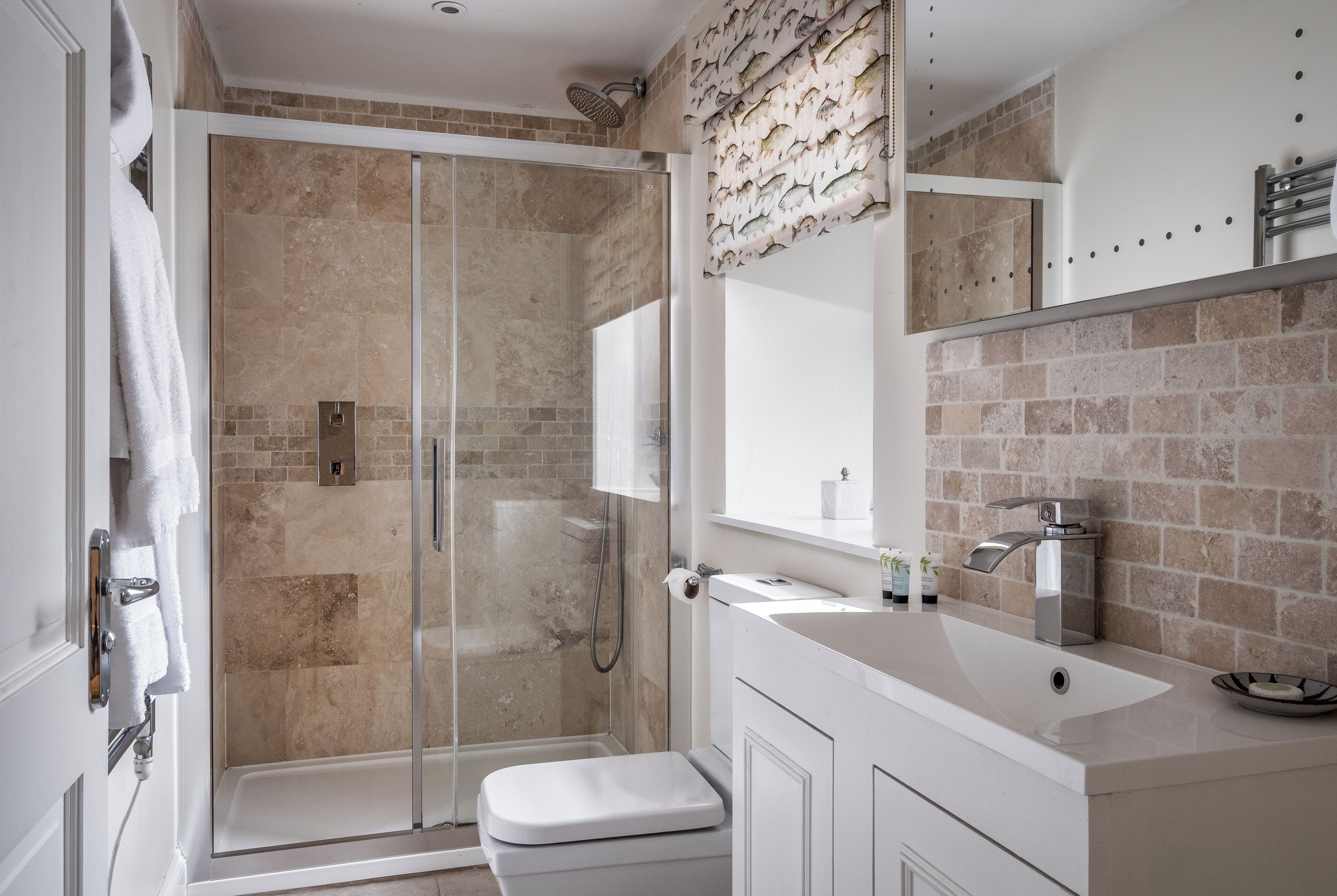deluxe suite | bathroom | free toiletries, hair dryer, dressing gowns, towels