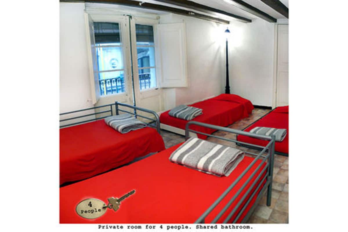 A private room for 4 people with a shared bathroom.