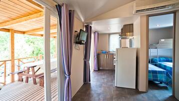 Casa mobile Deluxe | Area soggiorno | Tavolo da ping pong, libri