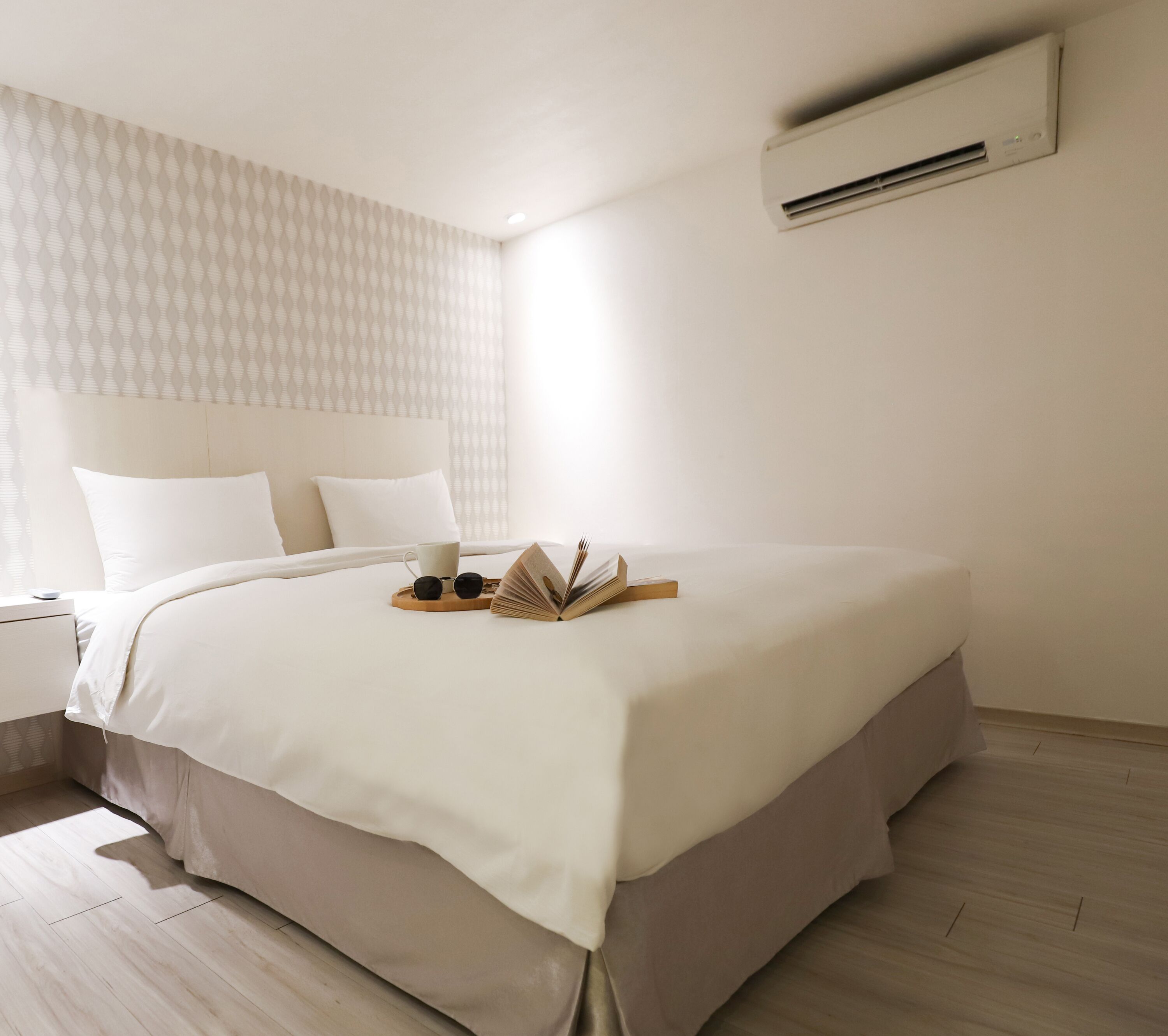 deluxe quadruple room with bathtub | premium bedding, down duvets, in-room safe, individually decorated