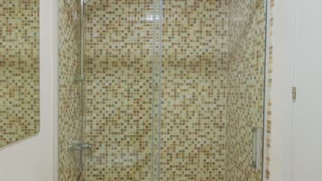 Shower, free toiletries, hair dryer, towels