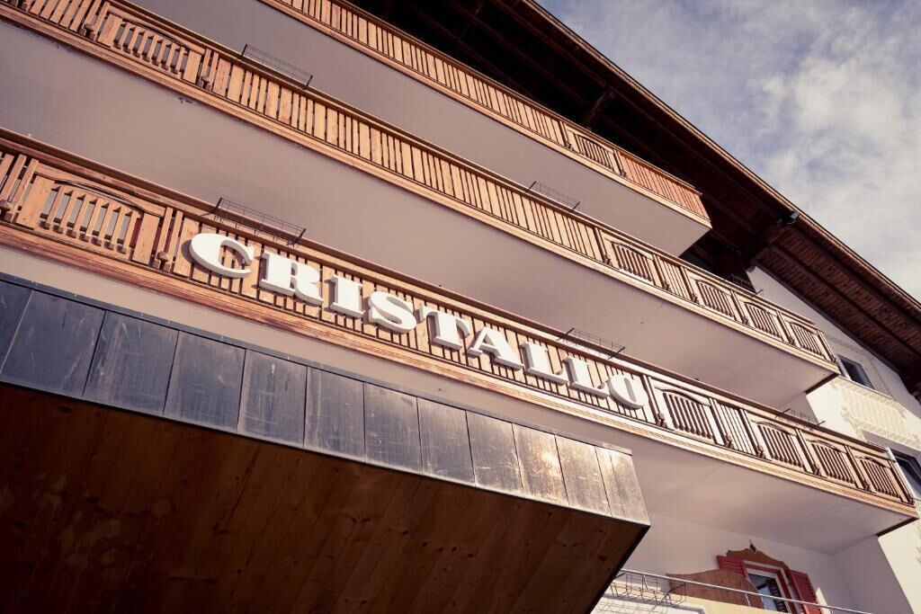 A building with the name 'Cristallo' prominently displayed on the facade.