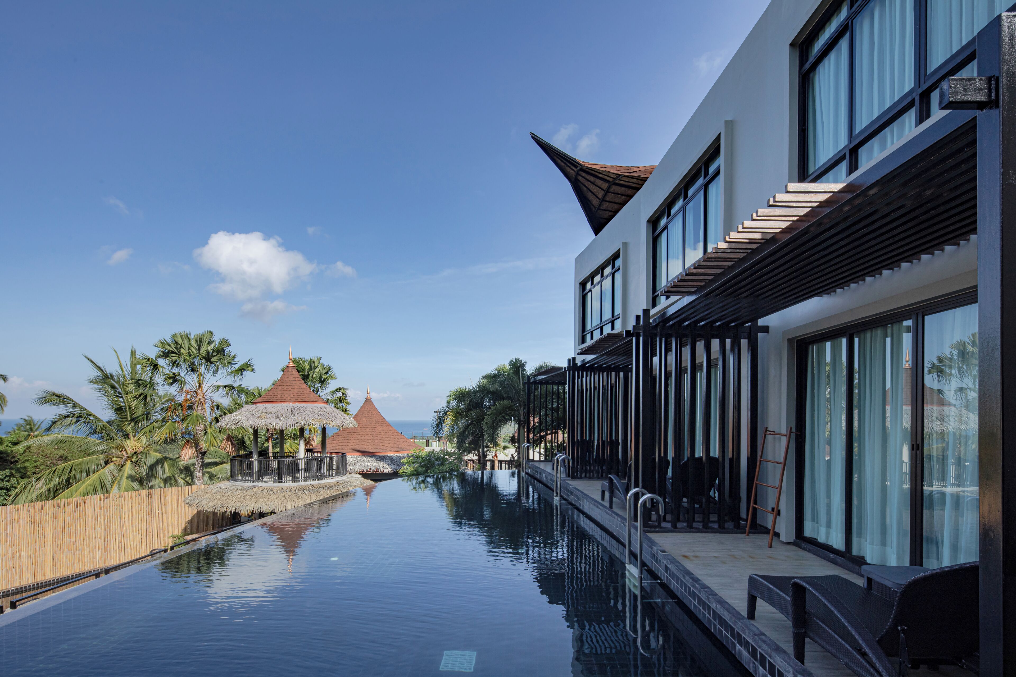 2 outdoor pools, open 7:00 AM to 7:00 PM, pool umbrellas, pool loungers