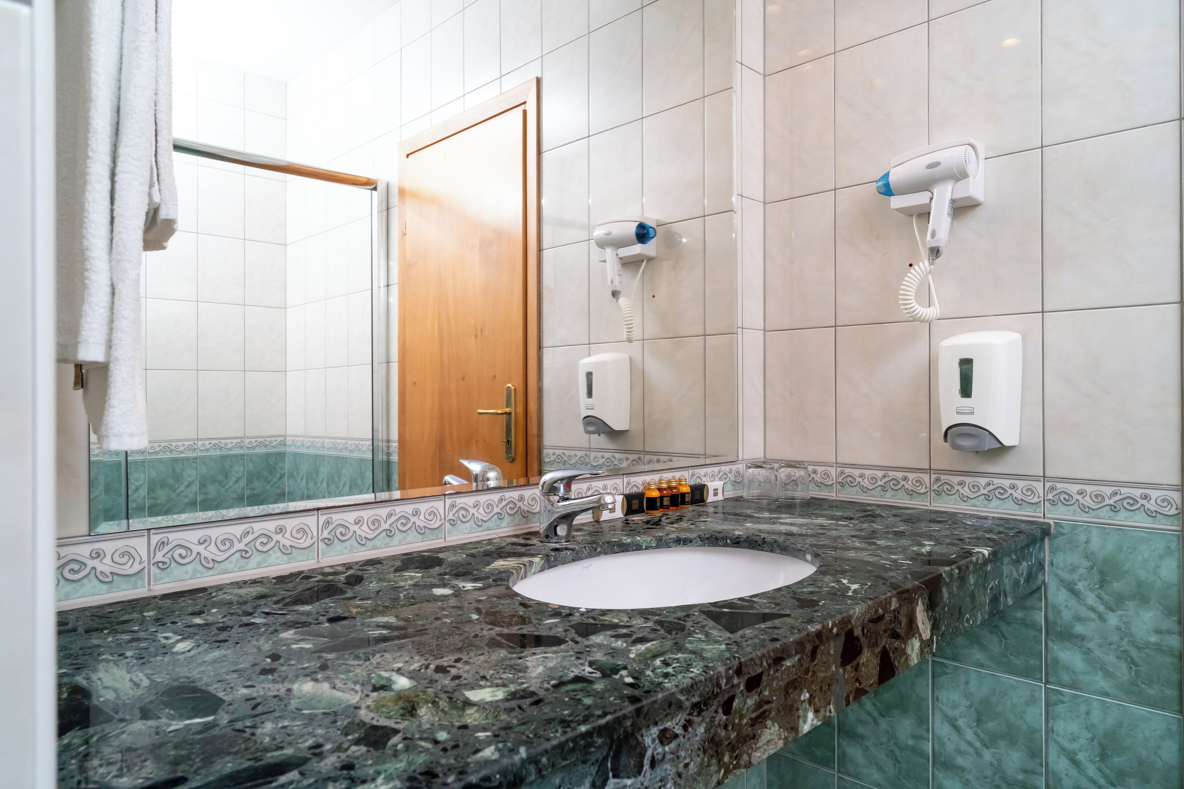 free toiletries, hair dryer, towels, soap