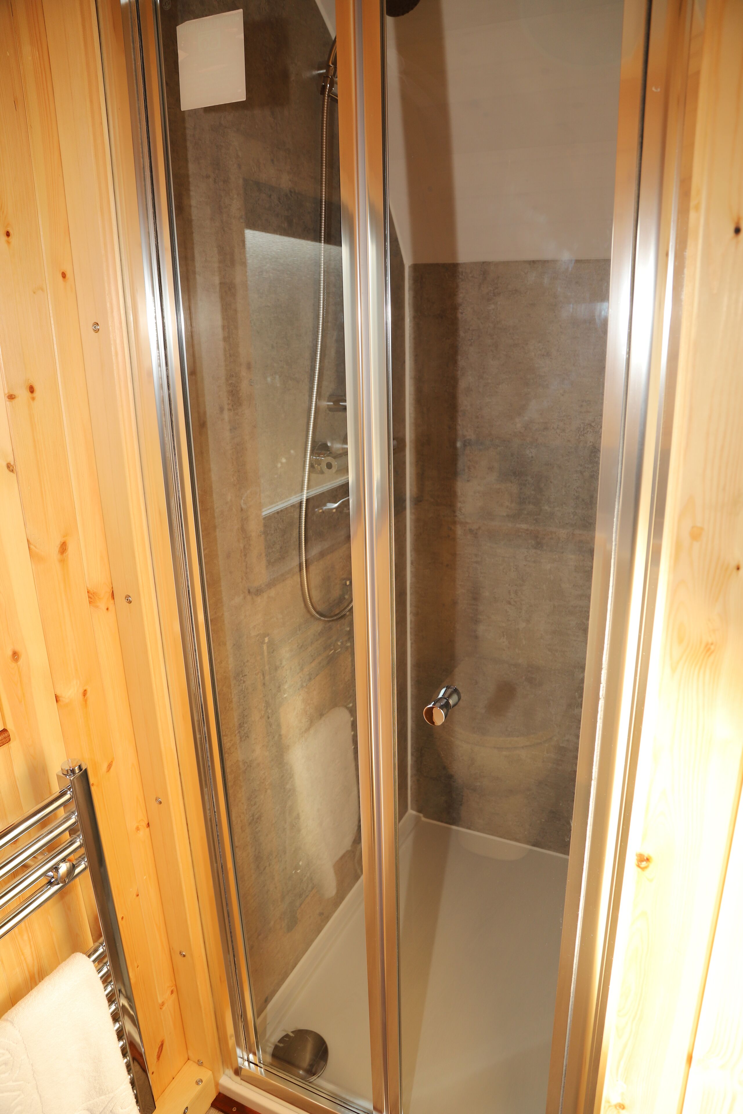 luxury cabin | bathroom | shower, free toiletries, hair dryer, towels