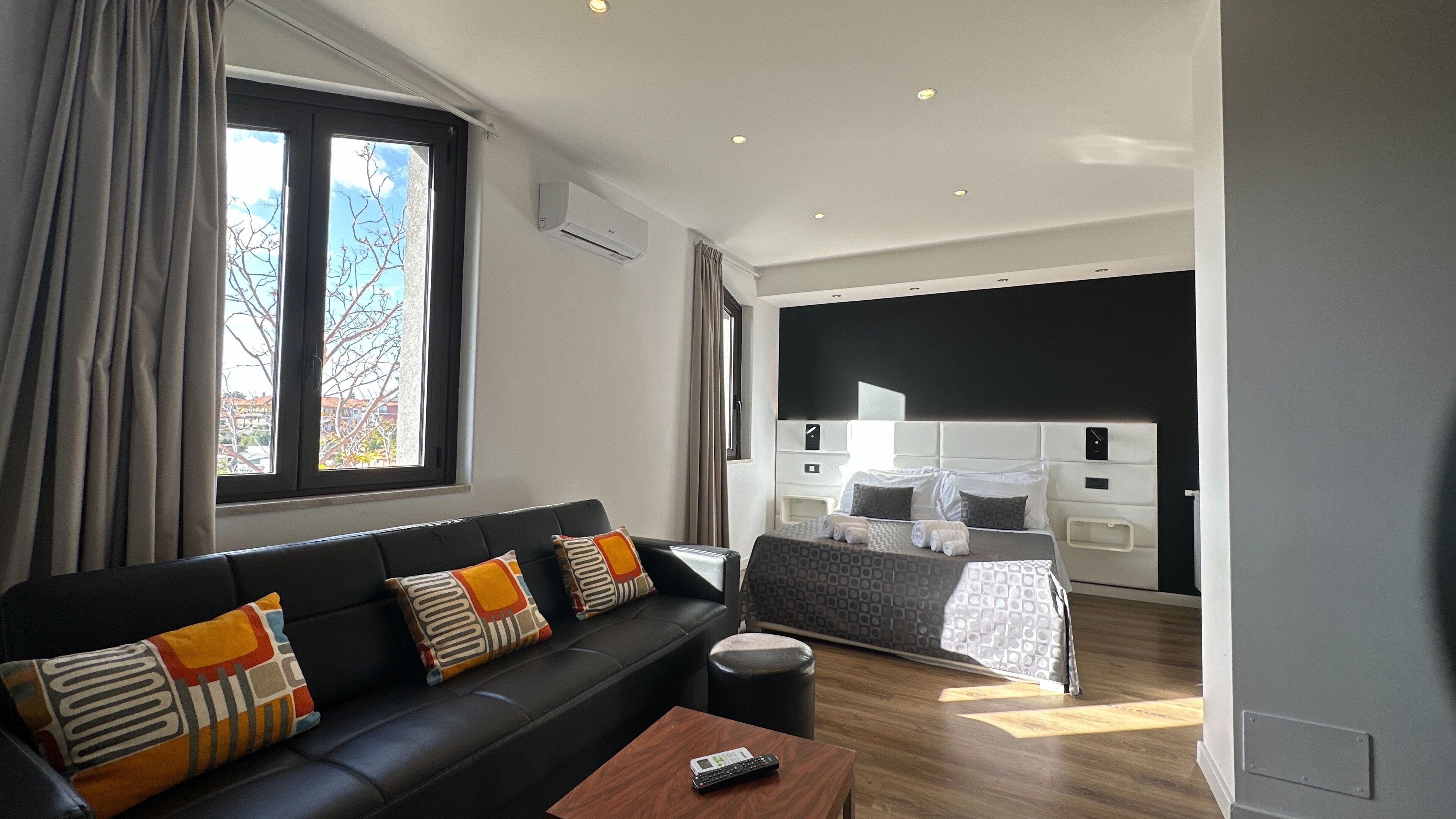 Premium bedding, blackout drapes, soundproofing, free WiFi