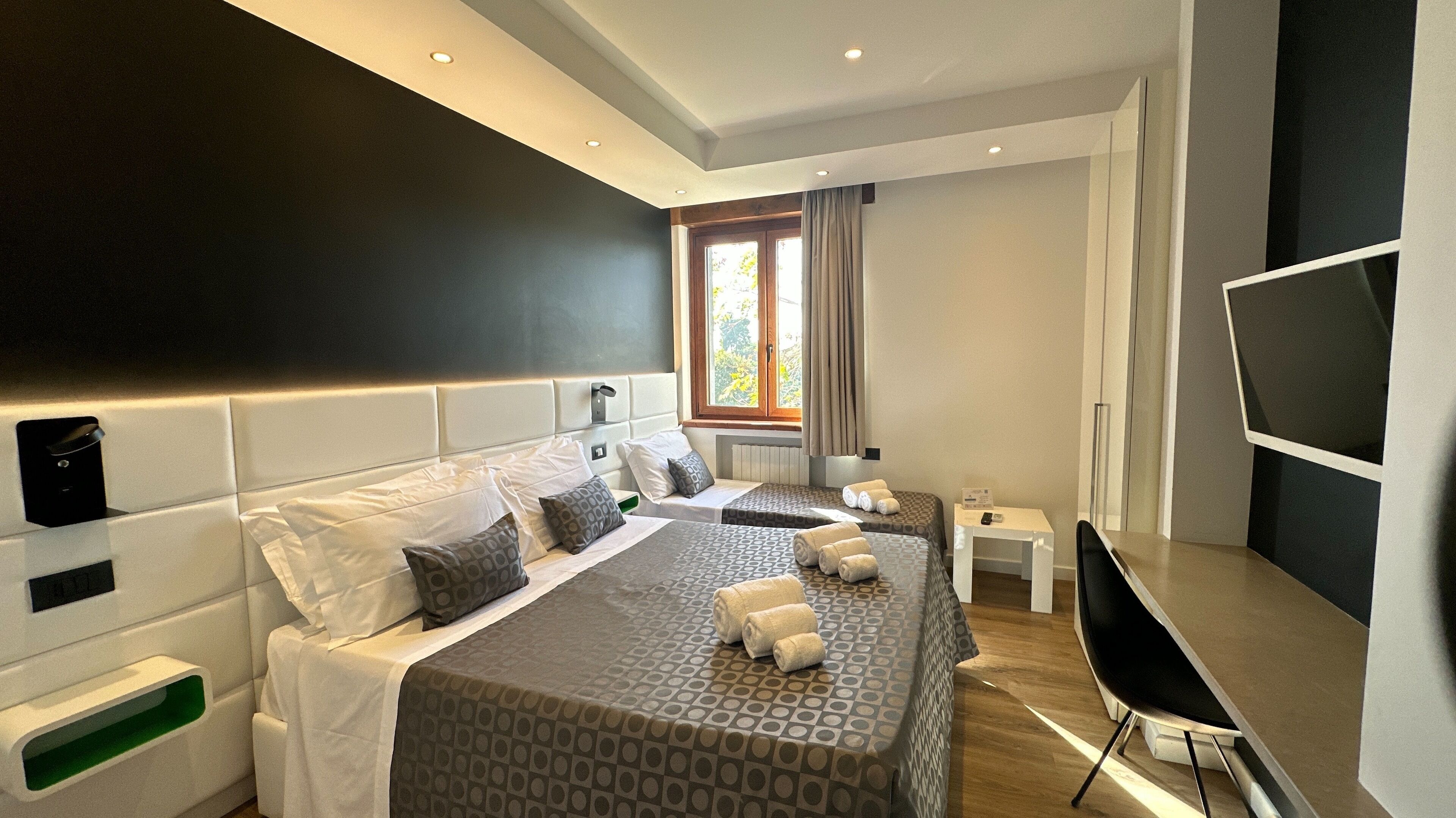 Premium bedding, blackout curtains, soundproofing, free WiFi