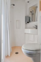 Shower, eco-friendly toiletries, hair dryer, towels