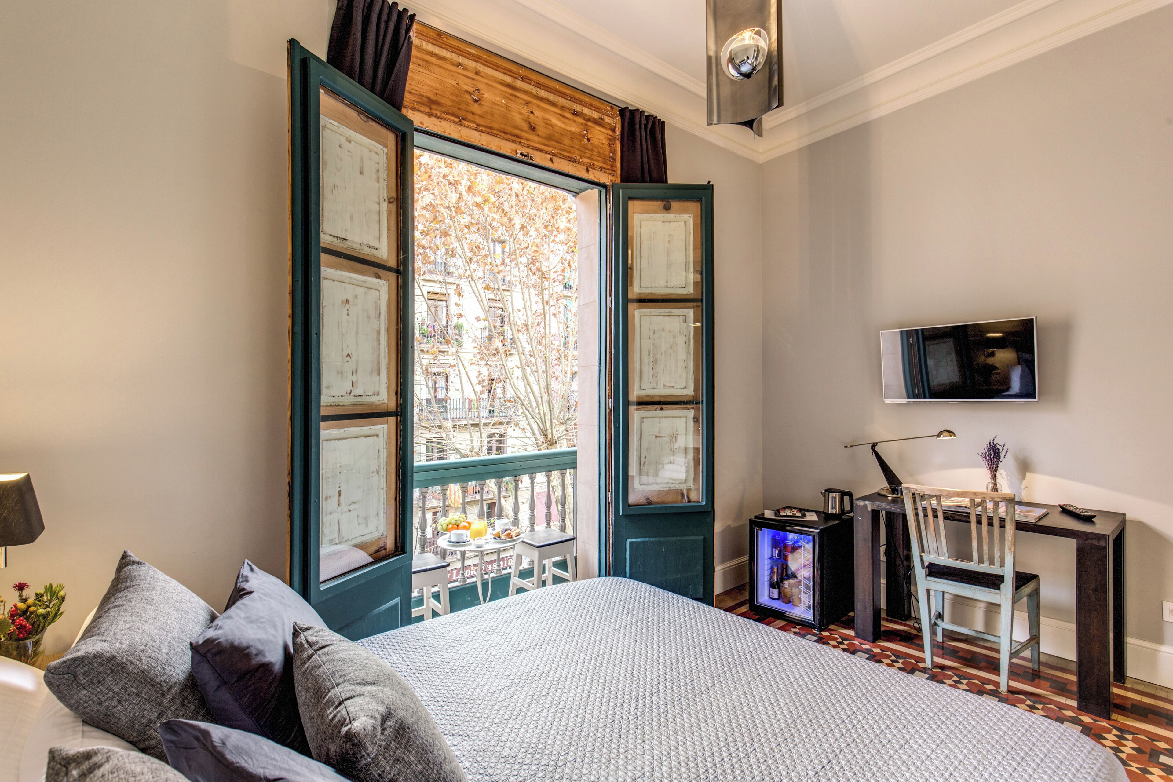 standard double room, balcony, city view | minibar, in-room safe, desk, blackout curtains