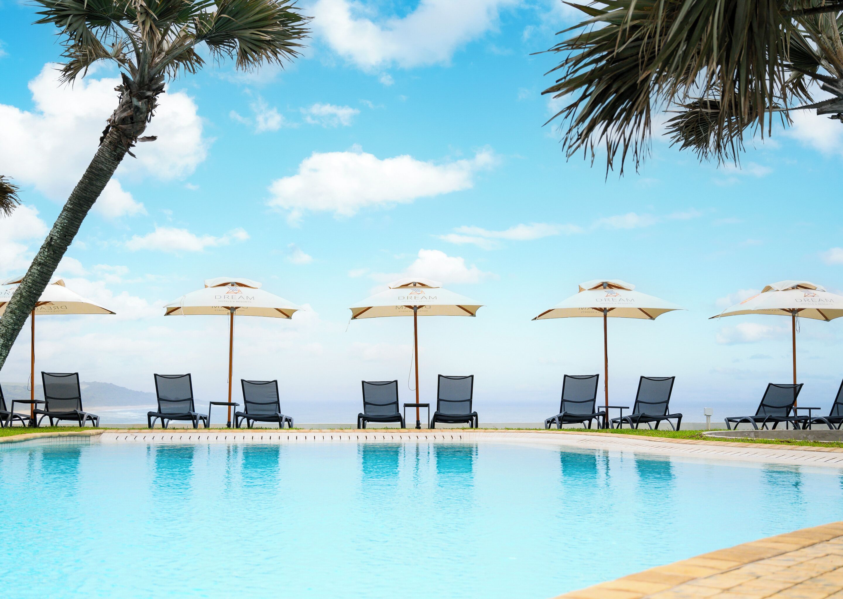 2 outdoor pools, pool umbrellas, pool loungers