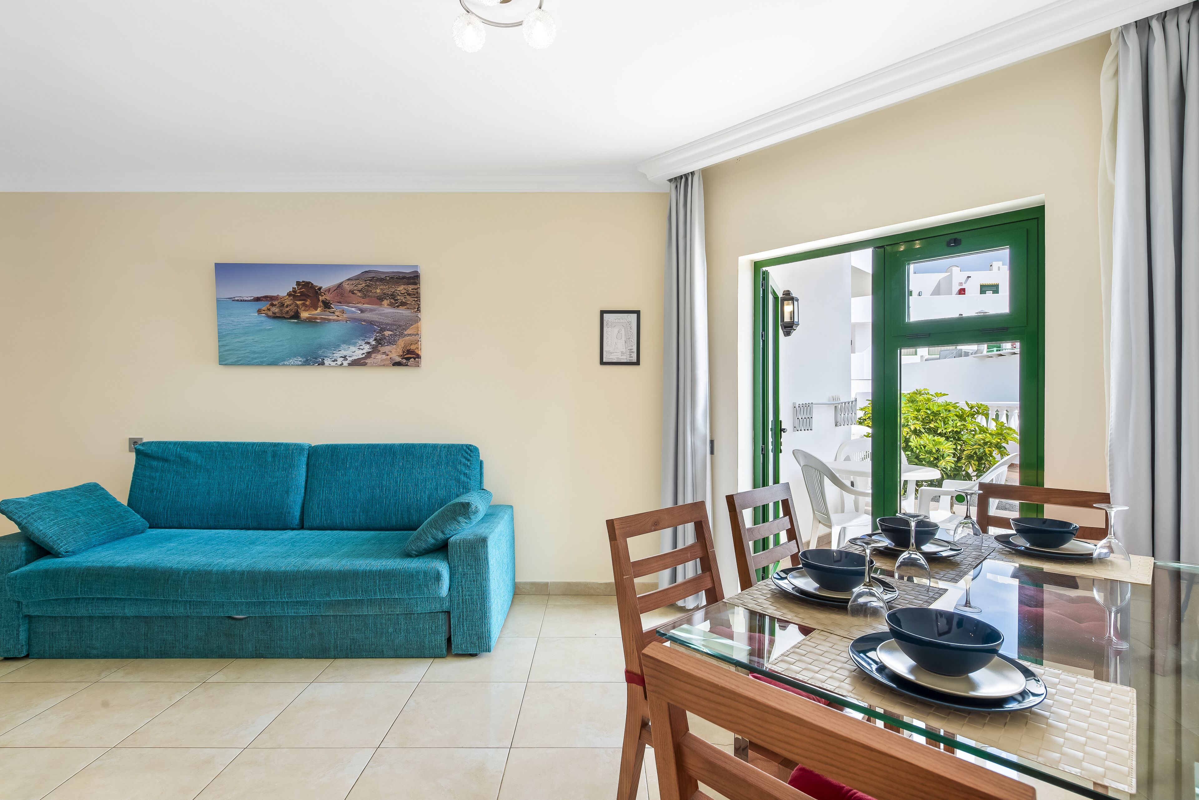 Club Apartment, 1 Bedroom | Living area | 24-inch LED TV with satellite channels, TV