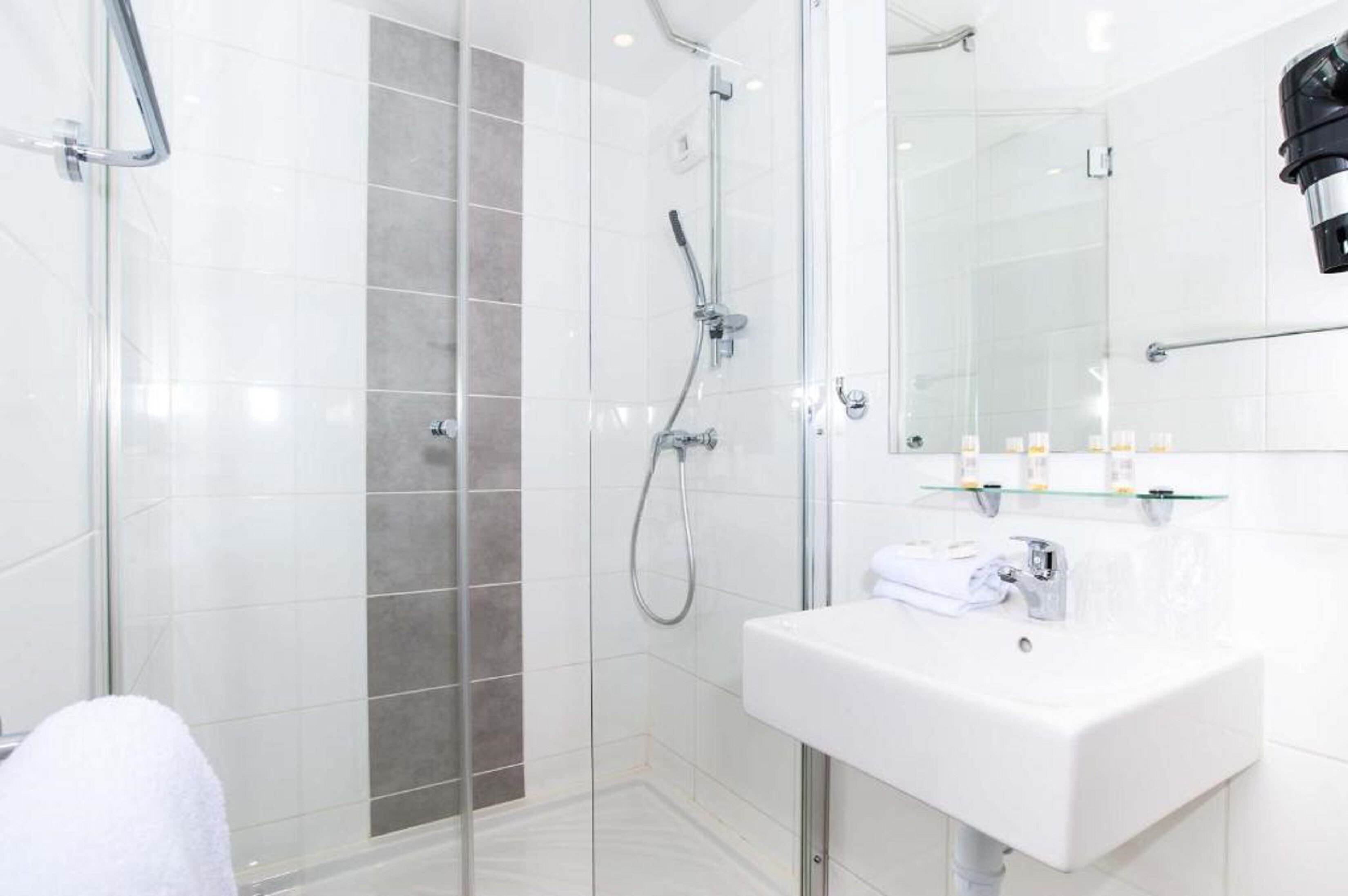 comfort quadruple room | bathroom | shower, free toiletries, hair dryer, towels