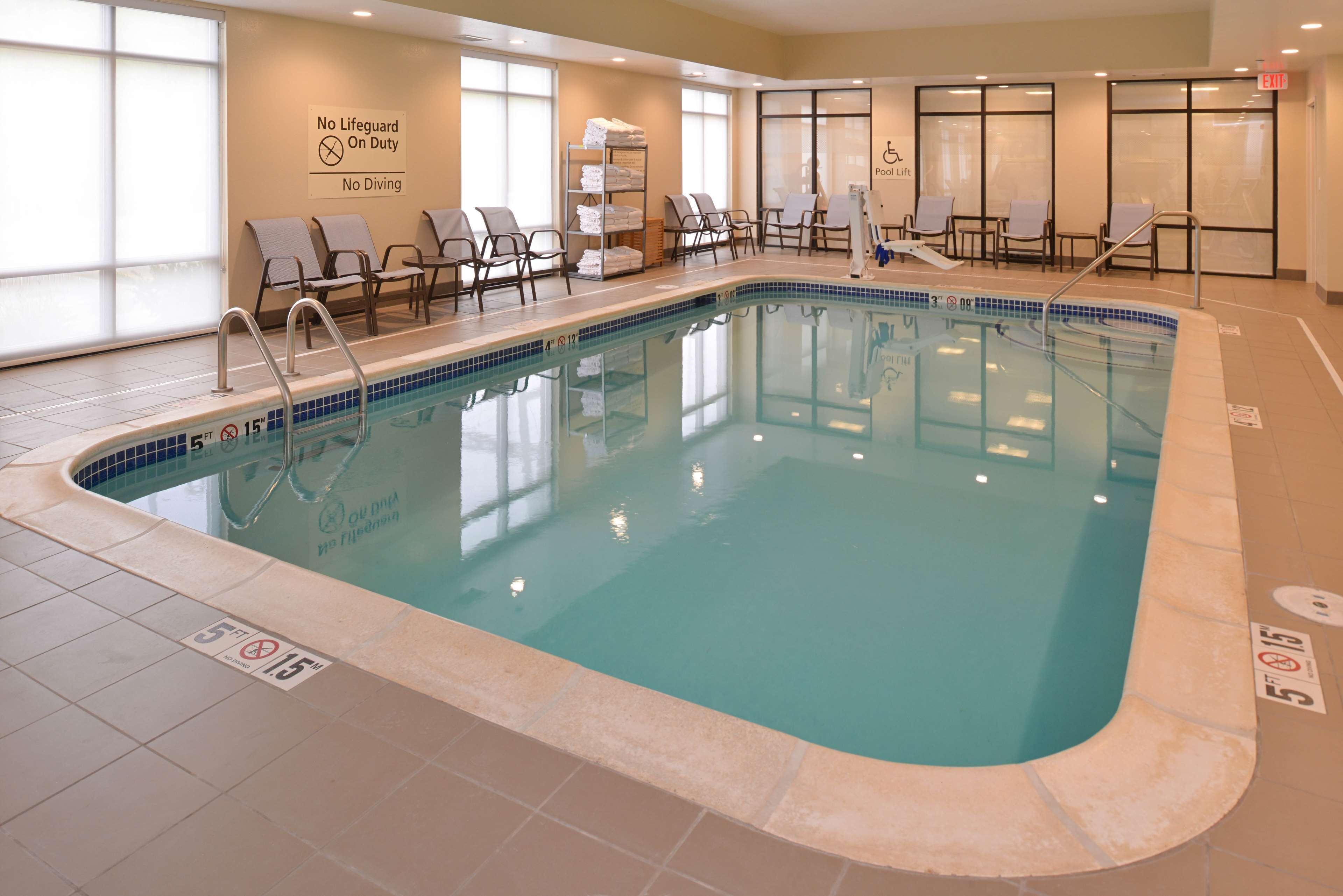 indoor pool, open 8:00 am to 10:00 pm, pool loungers