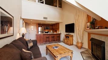 50-inch flat-screen TV with cable channels, TV, fireplace