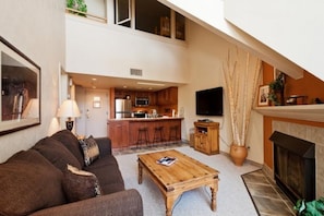 50-inch flat-screen TV with cable channels, TV, fireplace