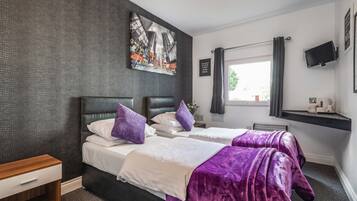 Individually decorated, individually furnished, desk, laptop workspace