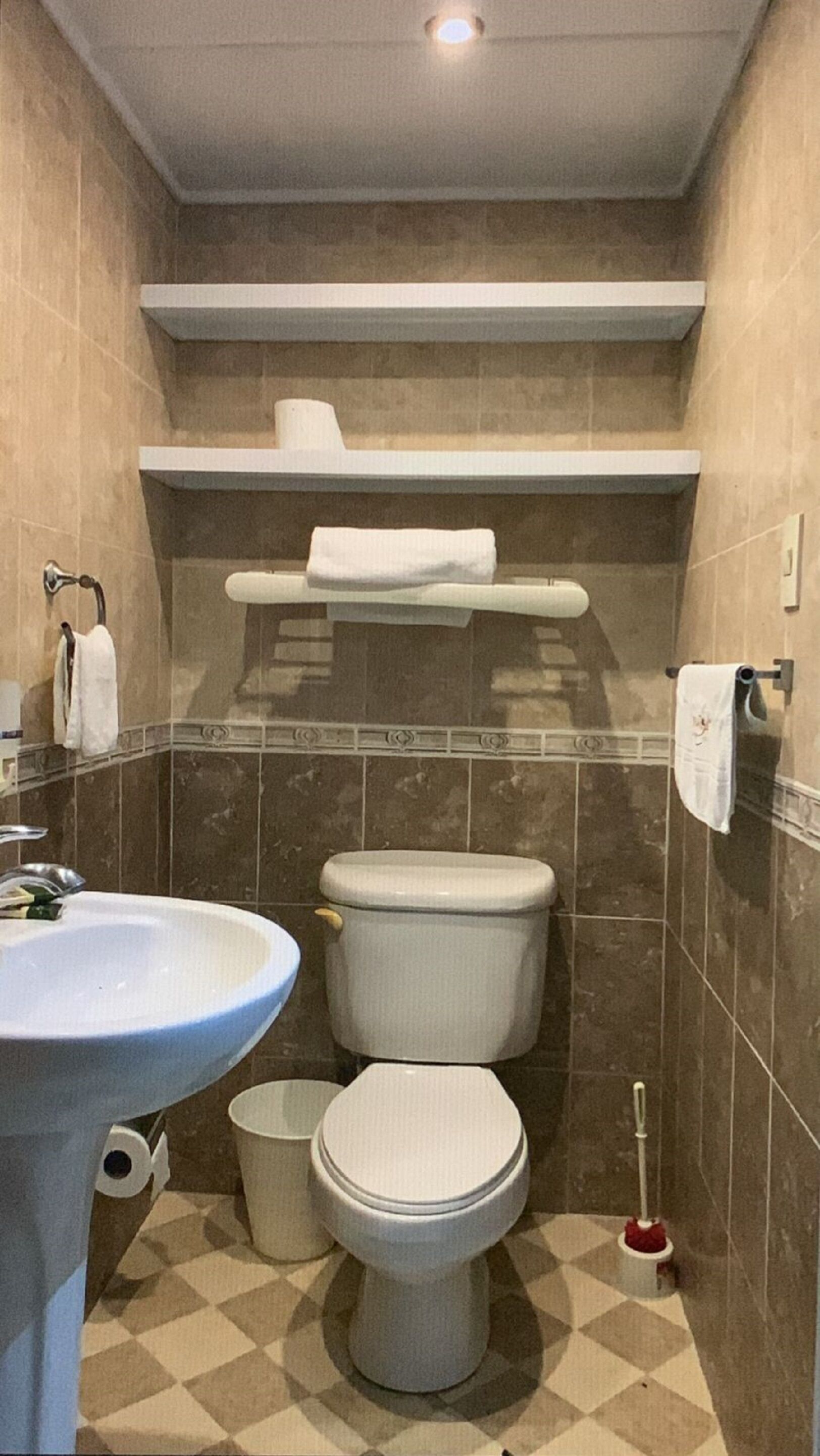 family quadruple room, 2 queen beds | bathroom | shower, free toiletries, hair dryer, towels