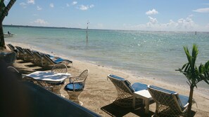 On the beach, white sand, beach shuttle, sun loungers
