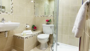 Shower, free toiletries, hair dryer, towels